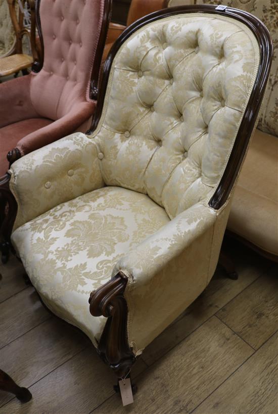A buttton back armchair